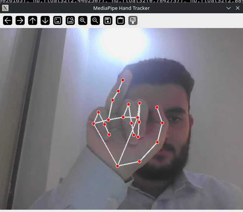 The MediaPipe landmark skeleton overlaid on a hand in the tracker&rsquo;s preview window